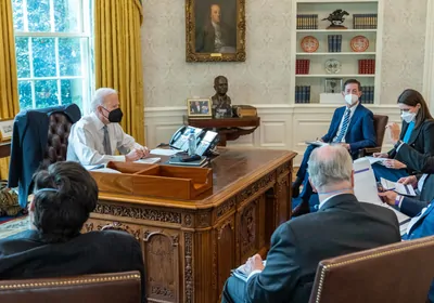 President Biden meeting with a group of people in the oval office President Biden meeting with a group of people in the oval office
